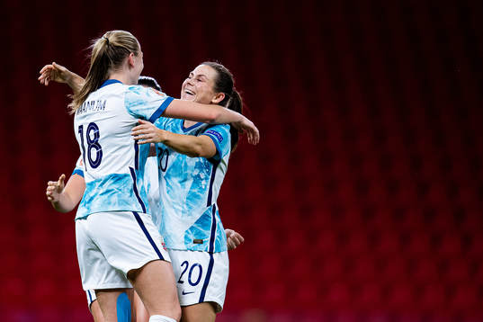 Frida Maanum and Emilie Bosshard Haavi of Norway celebrate