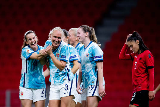 Tuva Hansen and Maria Thorisdottir of Norway celebrate