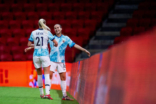 Karina Sævik and Guro Reiten of Norway celebrate