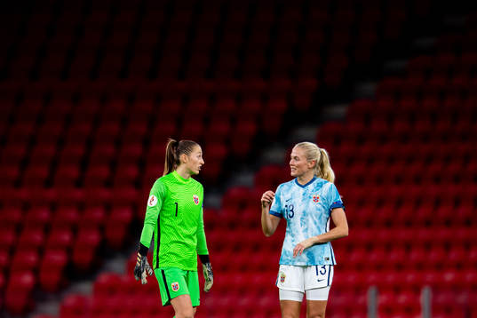 Goalkeeper Cecilie Fiskerstrand and Guro Bergsvand of Norway