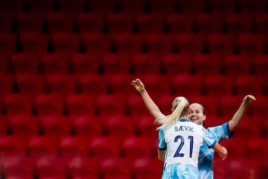Karina Sævik of Norway celebrates with teammate Guro Reiten