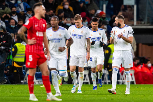 Toni Kroos, Casemiro and Karim Benzema of Real Madrid