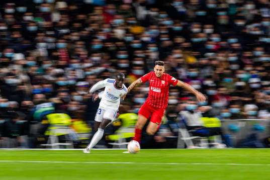 Ferland Mendy of Real Madrid and Lucas Ocampos of Sevilla