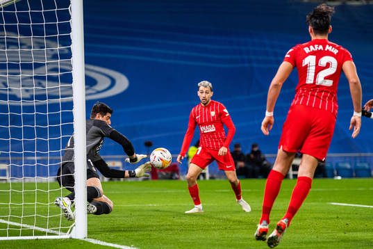 Goalkeeper Thibaut Courtois of Real Madrid with a save