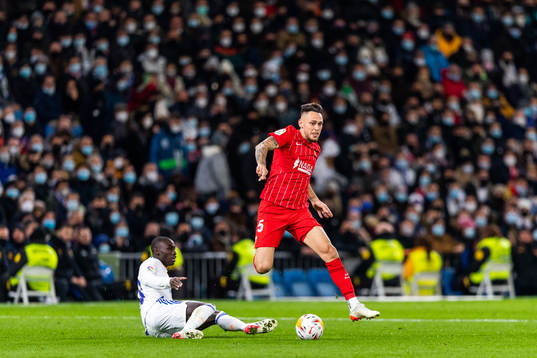 Ferland Mendy of Real Madrid and Lucas Ocampos of Sevilla