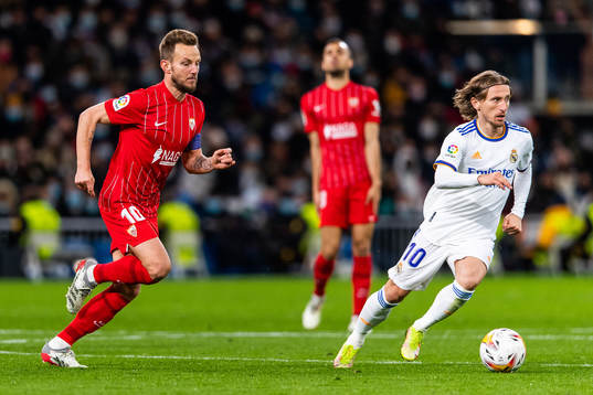 Ivan Rakitic of Sevilla and Luka Modric of Real Madrid