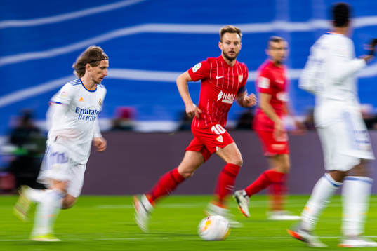 Luka Modric of Real Madrid and Ivan Rakitic of Sevilla