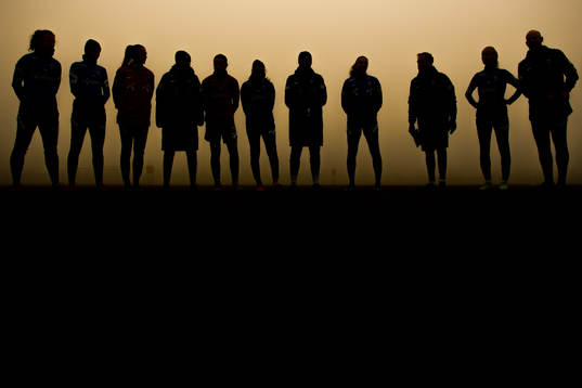 Silhouettes of the players and staff of the Norwegian