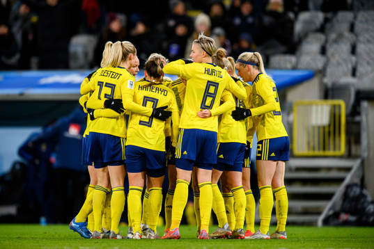 Players of Sweden celebrate the 2-0 goal by Fridolina Rolfö