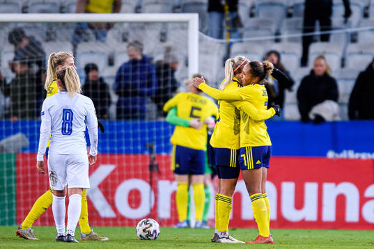 Hanna Glas and Madelen Janogy of Sweden celebrate