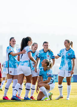 Ingrid Syrstad Engen of Norway celebrates with teammates