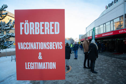 En informationsskylt gällande vaccinbevis för Covid-19