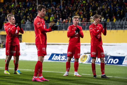 Mathias Knutsen Rasmussen of Brann and teammates