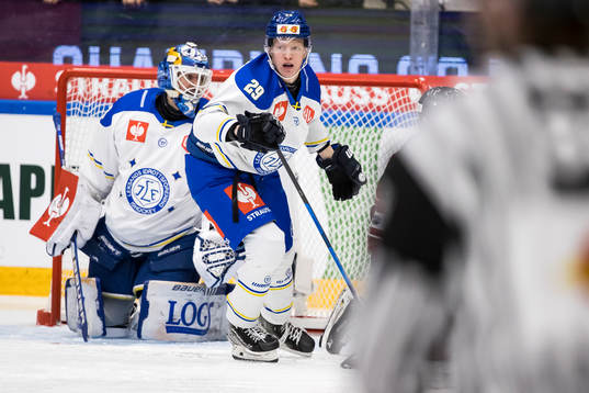 Emil Heineman  of Leksand and goalkeeper Axel Brage  of