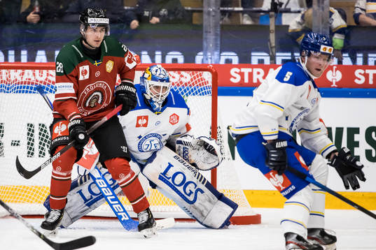 Johan Sundström of Frölunda  and goalkeeper Axel Brage
