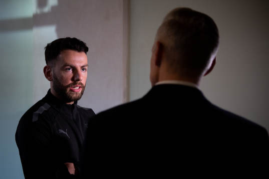Erdal Rakip is interviewed at the team hotel
