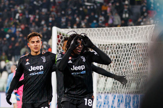 Paulo Dybala and Moise Kean of Juventus celebrate the 1-0