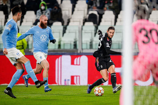 Jo Inge Berget of Malmö FF and Adrien Rabiot of Juventus