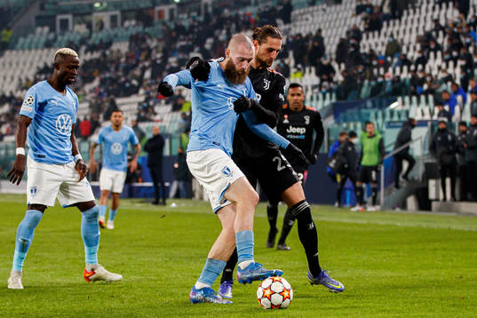 Jo Inge Berget of Malmö FF and Adrien Rabiot of Juventus