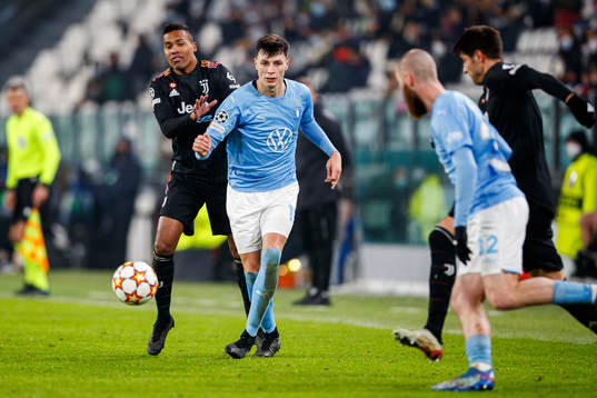 Alex Sandro of Juventus and Anel Ahmedhodzic of Malmö FF