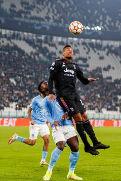 Malik Abubakari of Malmö FF and Alex Sandro of Juventus