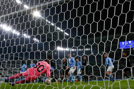 Goalkeeper Ismael Diawara of Malmö FF saves