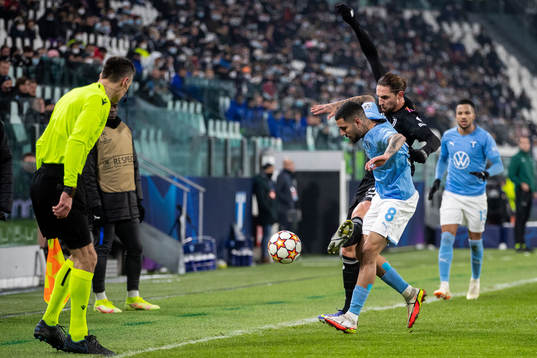 Sergio Pena of Malmö FF and Adrien Rabiot of Juventus