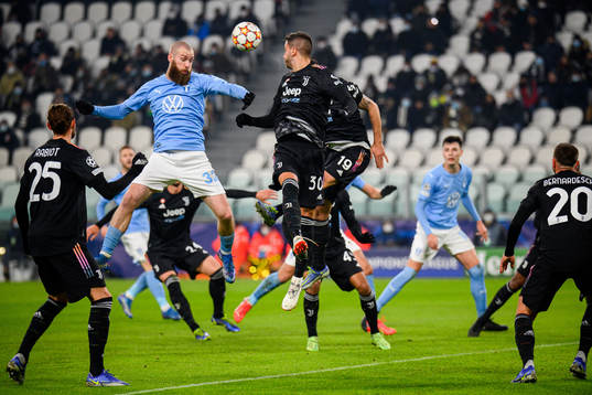 Jo Inge Berget of Malmö FF and Rodrigo Bentancur of