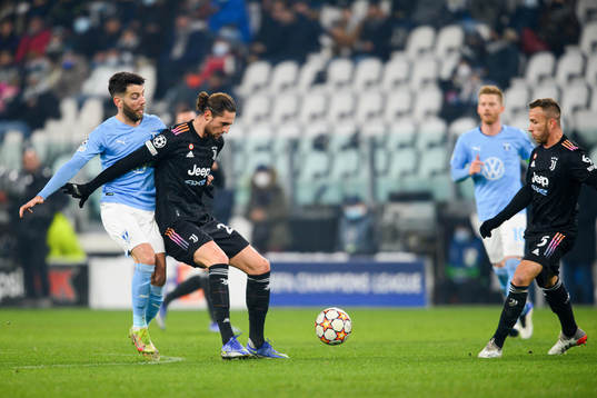 Erdal Rakip of Malmö FF and Adrien Rabiot of Juventus