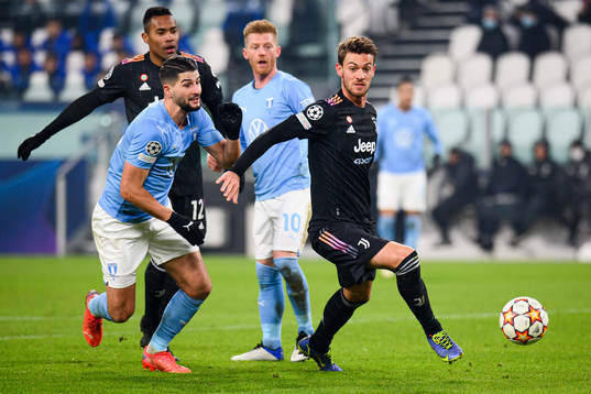 Antonio Colak of Malmö FF and Daniele Rugani of Juventus