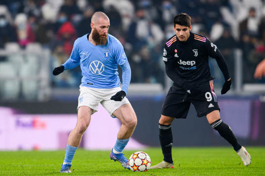 Jo Inge Berget of Malmö FF and Alvaro Morata of Juventus
