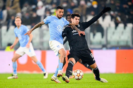 Sergio Pena of Malmö FF and Alvaro Morata of Juventus