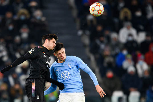 Alvaro Morata of Juventus and Anel Ahmedhodzic of Malmö FF