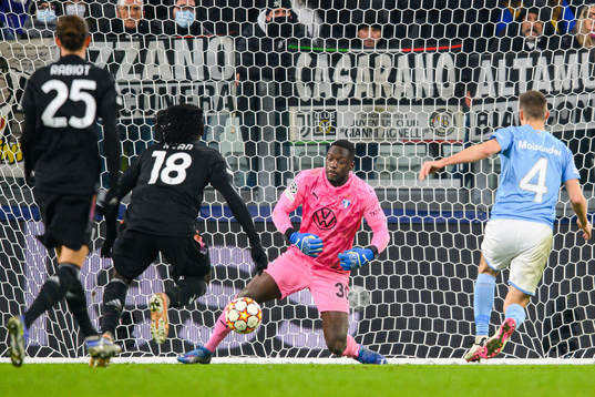 Moise Kean of Juventus against goalkeeper Ismael Diawara of