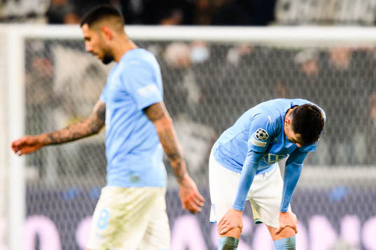 Sergio Pena and Anel Ahmedhodzic of Malmö FF look dejected