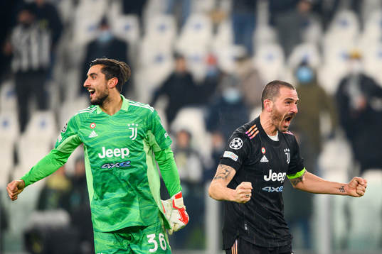 Goalkeeper Mattia Perin and Leonardo Bunucci of Juventus