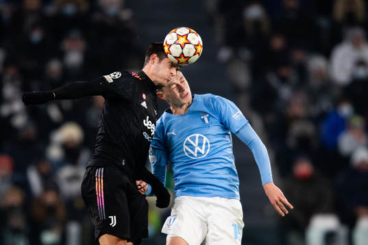 Alvaro Morata of Juventus and Anel Ahmedhodzic of Malmö FF