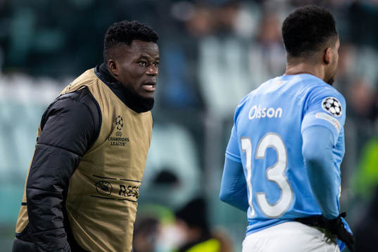 Malik Abubakari and Martin Olsson of Malmö FF