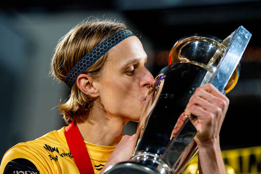 Ulrik Saltnes of Bodø/Glimt kisses the trophy winning the