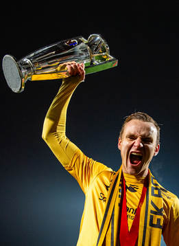 Marius Lode of Bodø/Glimt celebrates with the trophy