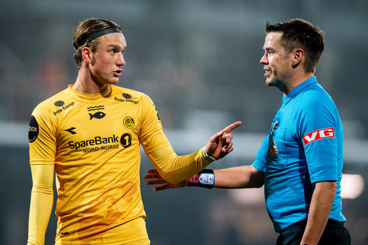 Erik Botheim of Bodø/Glimt talks to referee Tom Harald