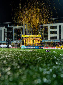 Players and staff of Bodø/Glimt celebrate with the trophy