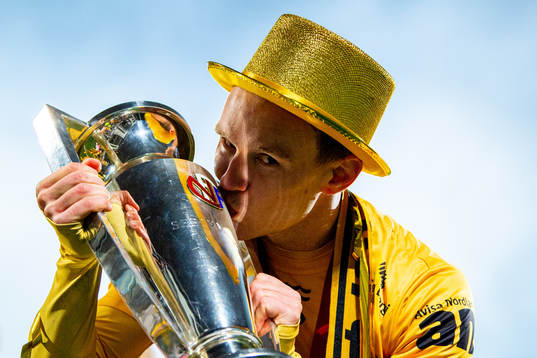 Marius Lode of Bodø/Glimt celebrates with the trophy