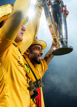 Amahl Pellegrino of Bodø/Glimt celebrates with the trophy
