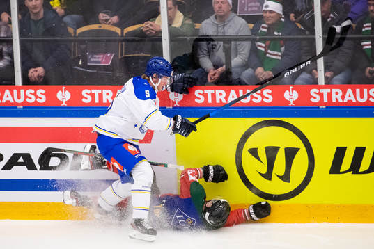 Calle Själin of Leksand  hits Ryan Lasch of Frölunda