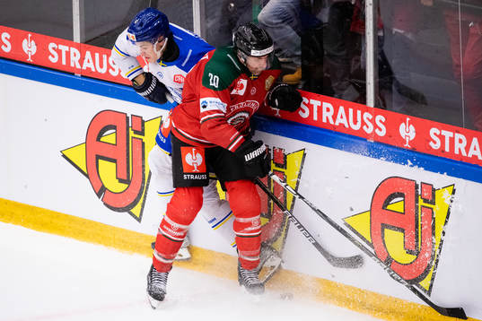 Alexander Lundqvist of Leksand  is hit by Joel Lundqvist of