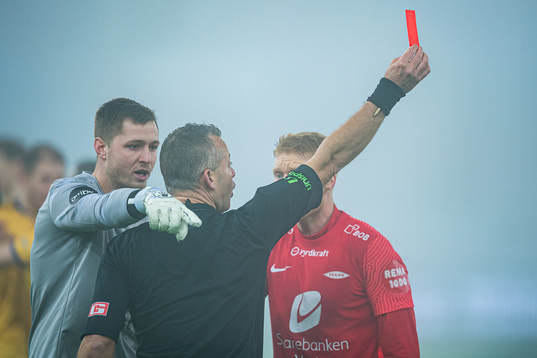 Runar Ullaland Hove of Brann (not pictured) receiving a red