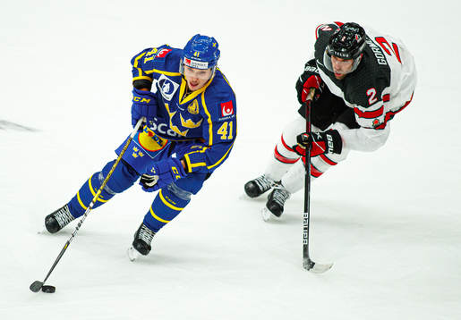 Dmytro Timashov of Sweden against Brandon Gormley of Canada