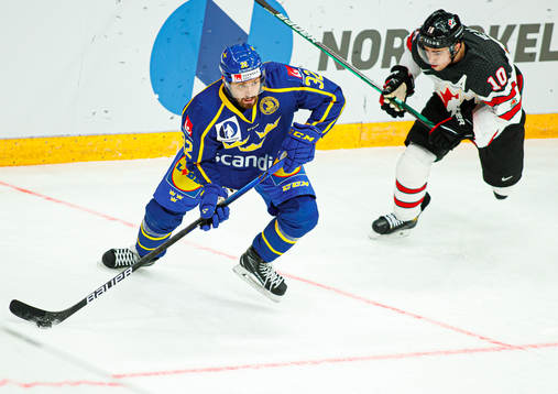 Lukas Bengtsson of Sweden against Jordan Weal of Canada