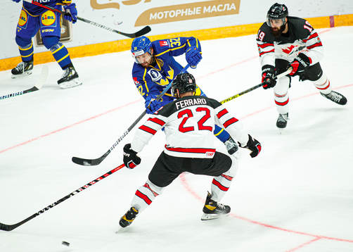 Lukas Bengtsson of Sweden against Eric O'Dell of Canada
